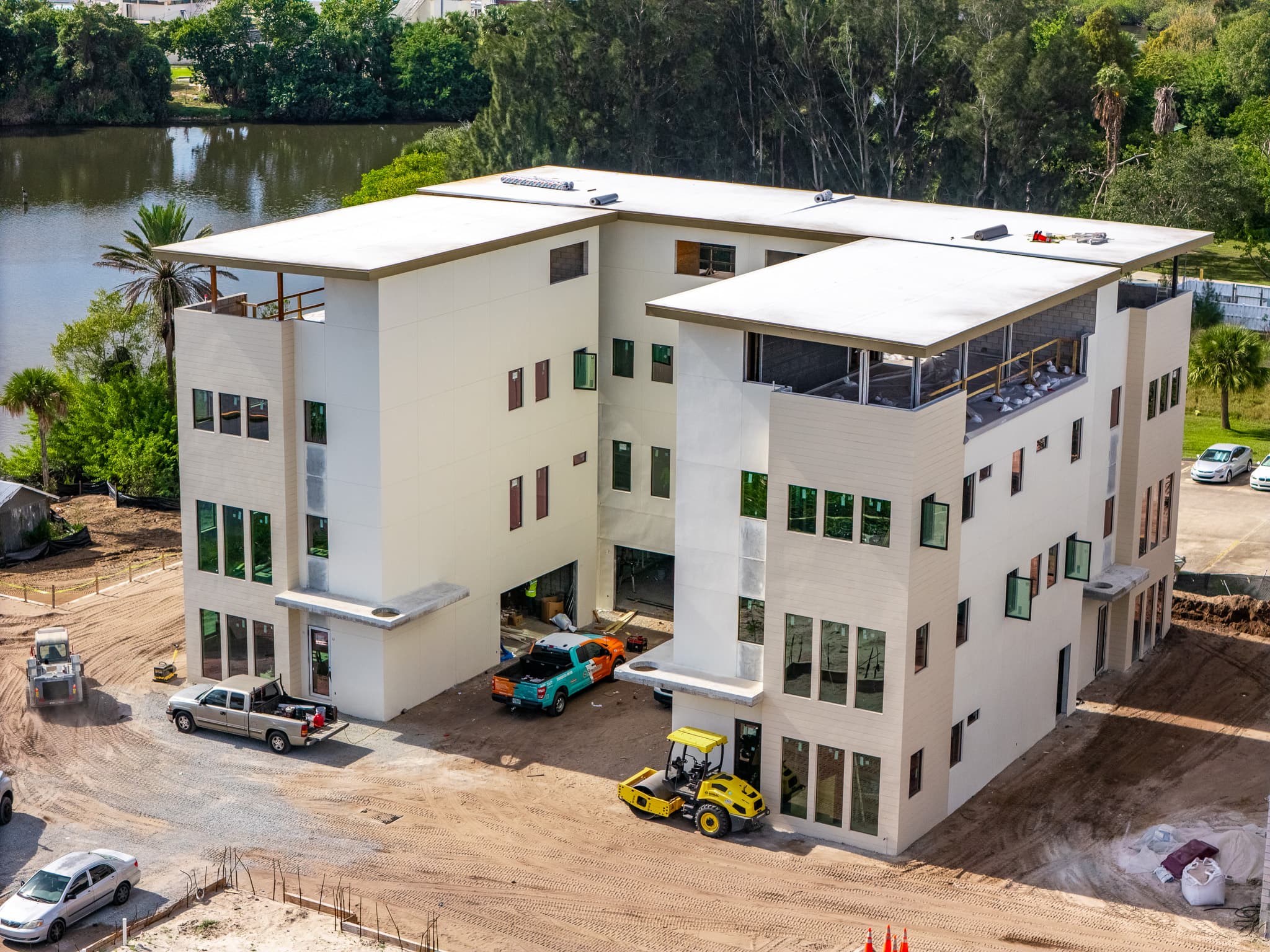 Watersedge aerial — building and Crane Creek