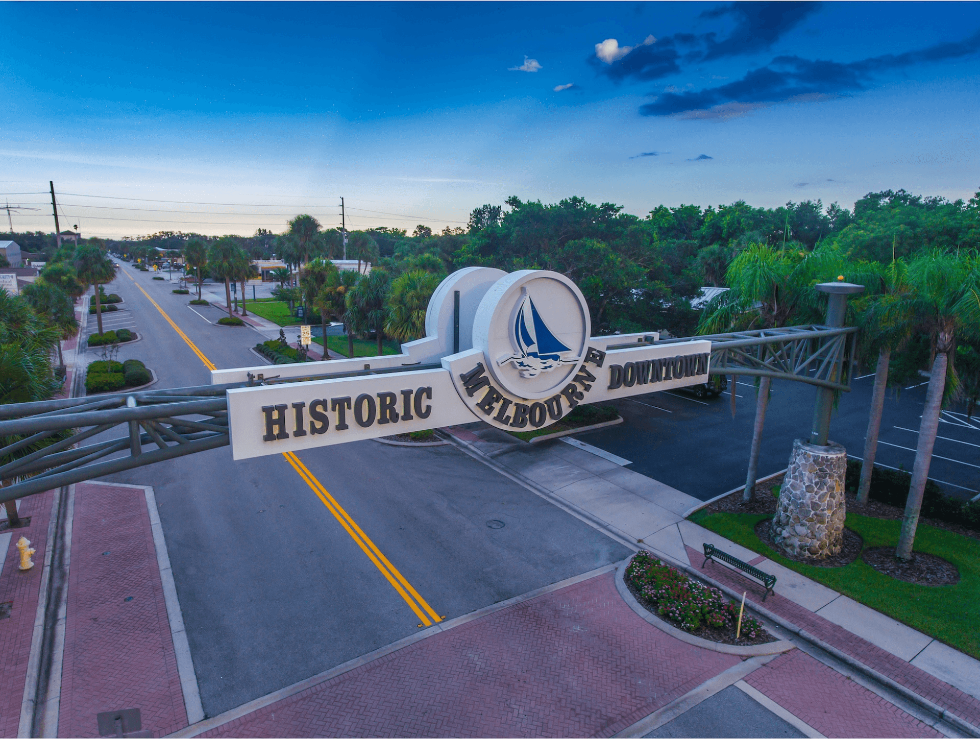 Historic Downtown Melbourne sign illuminated at dusk